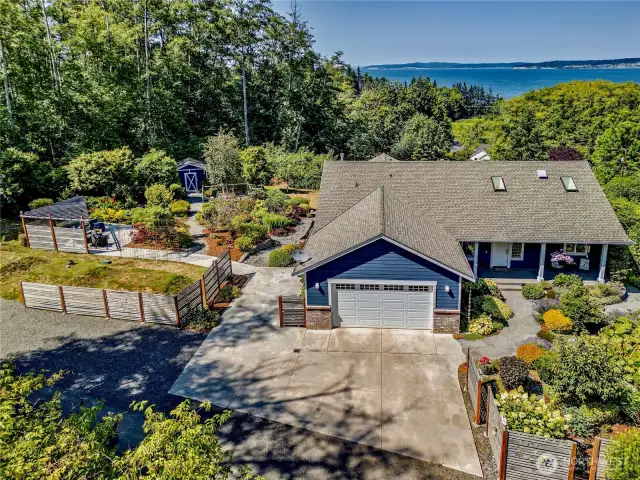 Home is sited on 2 lots, basically a little island of its own, if you purchase the additional lot.