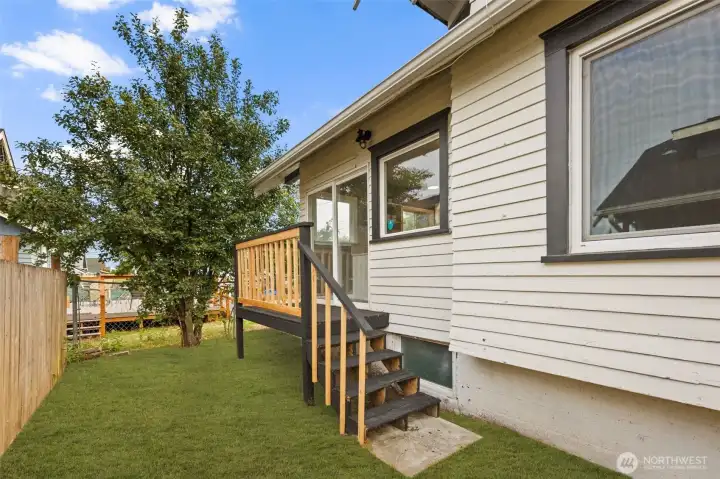 Back Porch with new railing. Grass virtually edited