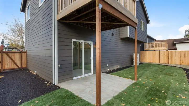 Back yard is fenced and landscaped