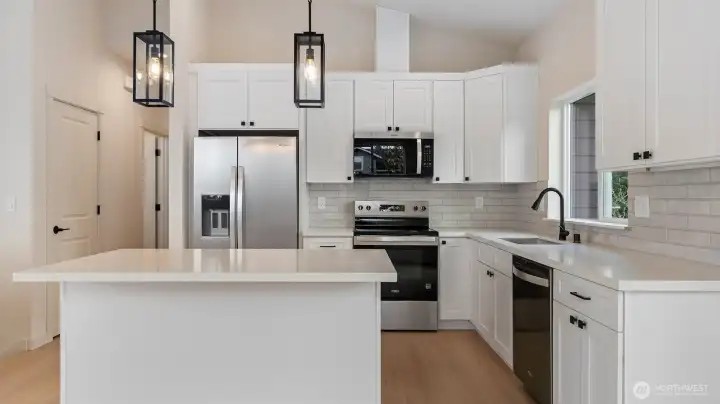 Island offers so much prep space and additional seating area.