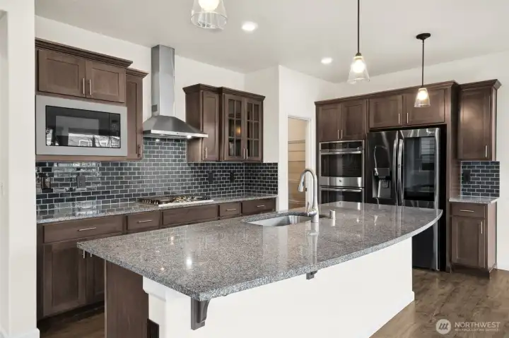 Gourmet kitchen with true double ovens