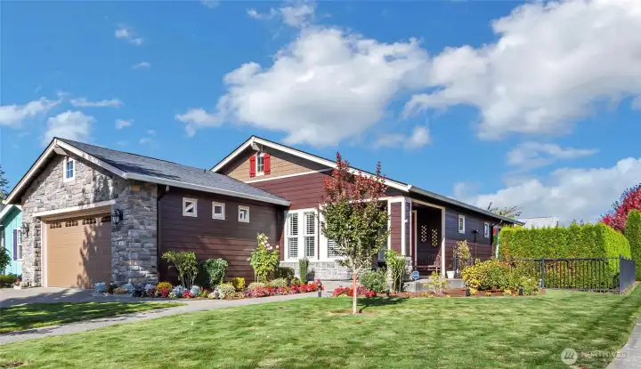 Welcome to this lovely home offering professionally designed features throughout her nearly 1600 sq feet. She is set on a coveted corner lot, shrouded with privacy hedges - this lot is absolutely a one-and-only!