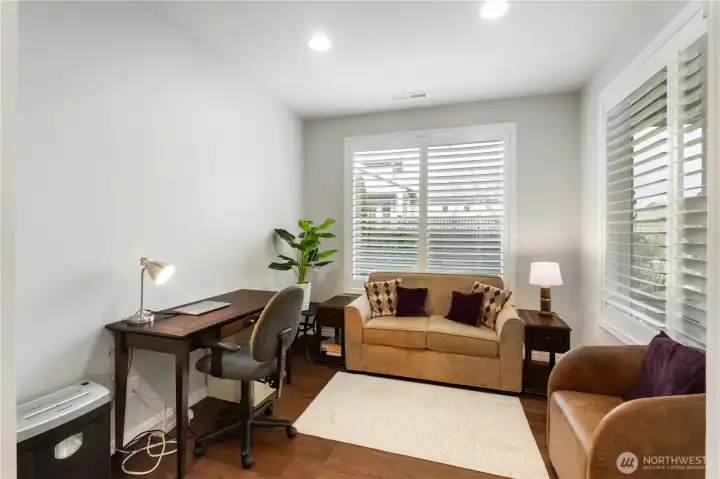 Den / office has smart wall dividers that can be used to facilitate more overnight visitors. Space accommodates this full-sized sofa-bed super comfortably.