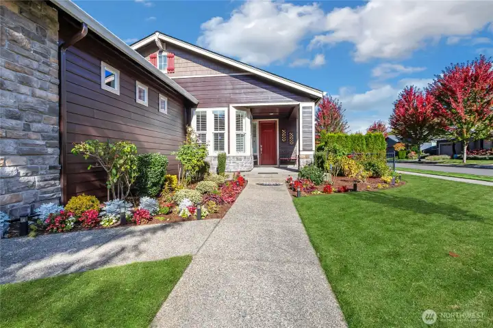Welcome home! This lovely walkway is lit up at night and rain or shine, this is an absolute jewel of the neighborhood!