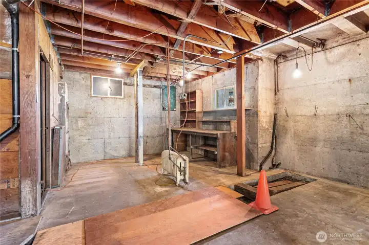 Workspace in the back, and on the left you can see a doorway which leads to what used to be a dark room.