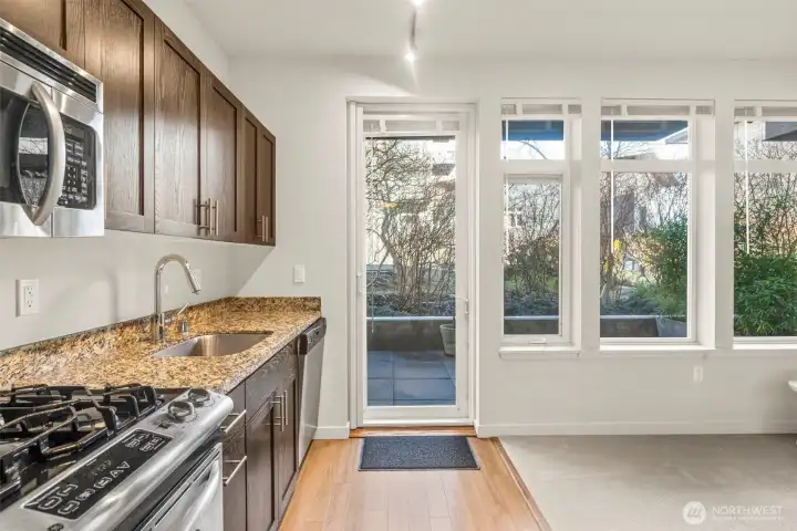 Access door to patio extends your entertaining space to the outdoors.