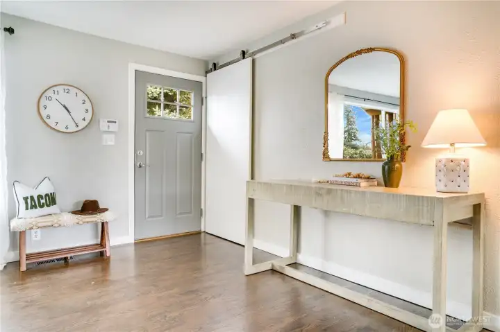 To the right of the front door is the inconspicuous coat closet.