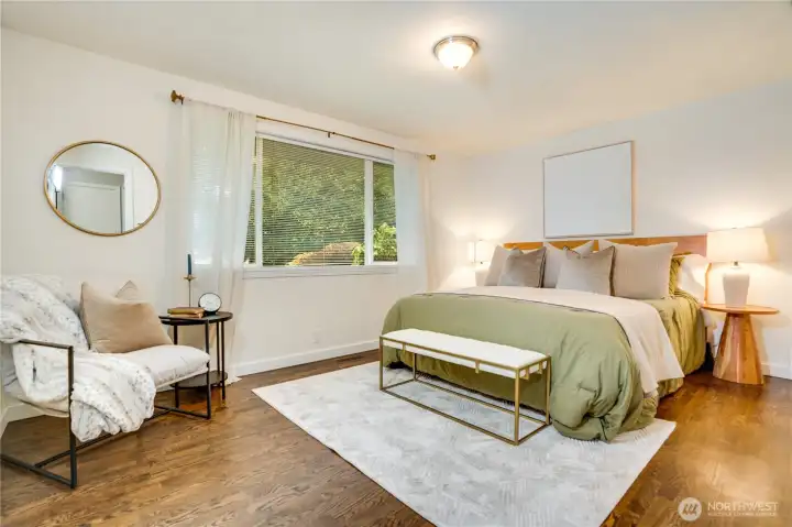 This is the primary bedroom on the main floor. Located in the northeast corner of the home.