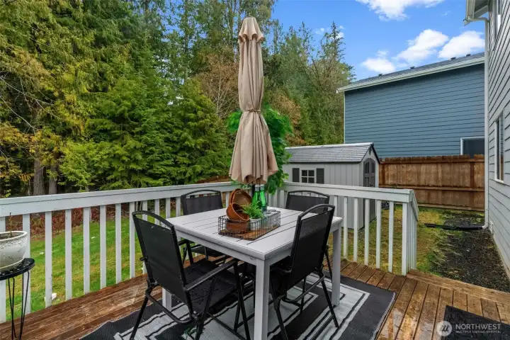 deck off bonus room with stairs to yard