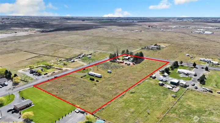 Wow! Spacious! A little over 4 acres minutes from town!