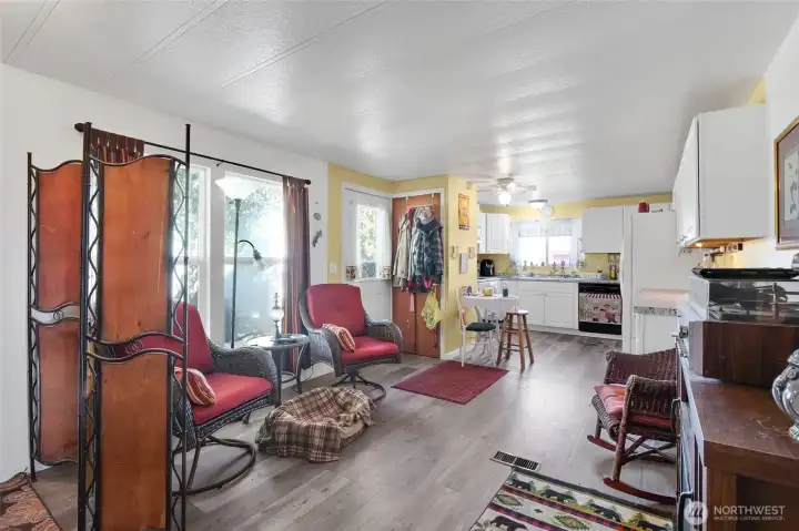 Large updated kitchen -sunroom style dining area too!