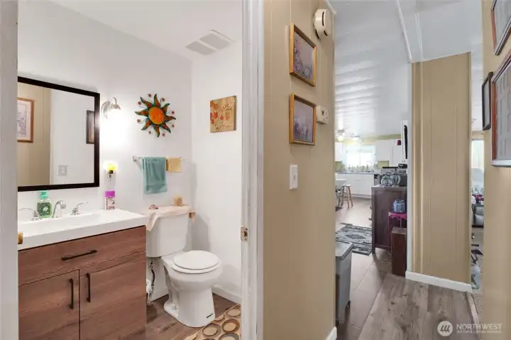 Second bathroom -upgraded too. Newer sink, toilet, and flooring. Beautifully remodeled.