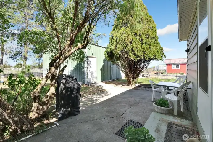 Fully fenced back yard allows for a pet safe environment.
