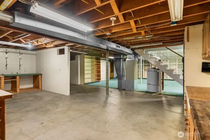 Shop area with entrance to garage stairs