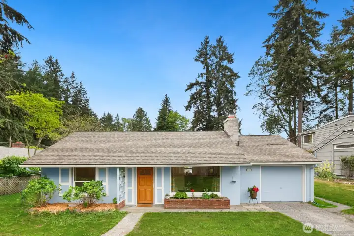 Welcome home to this friendly rambler next to Hamlin Park!