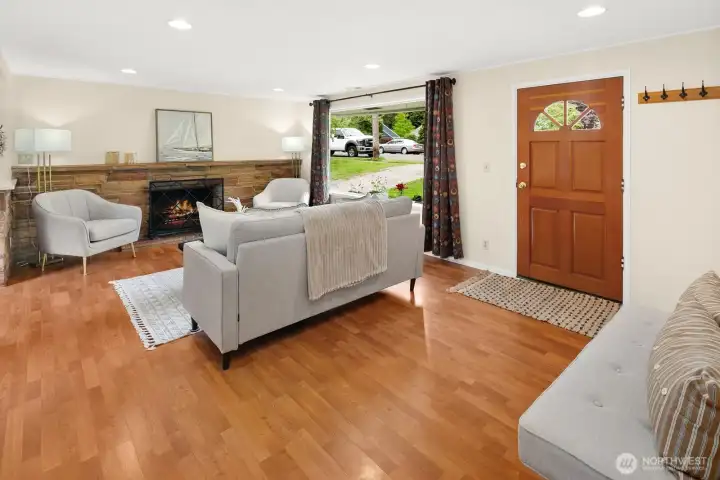 The living room greets you as you step in the front door.  Perfect for family gathering and entertaining.