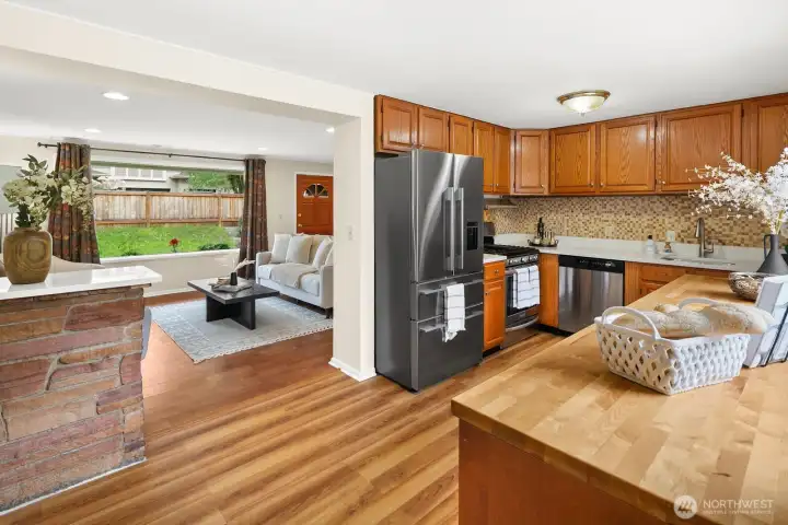 The kitchen is open enough to feel connected to the rest of the house, but still tucked away and out of sight from the main living room and dining areas.