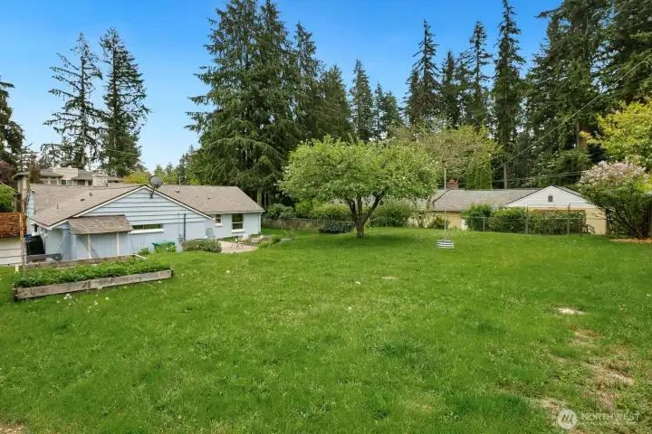 Huge, double-size backyard is almost 10,000 square feet.  Room for kicking the soccer ball, throwing the baseball, playing tag, entertaining or just having a little piece of nature for yourself.