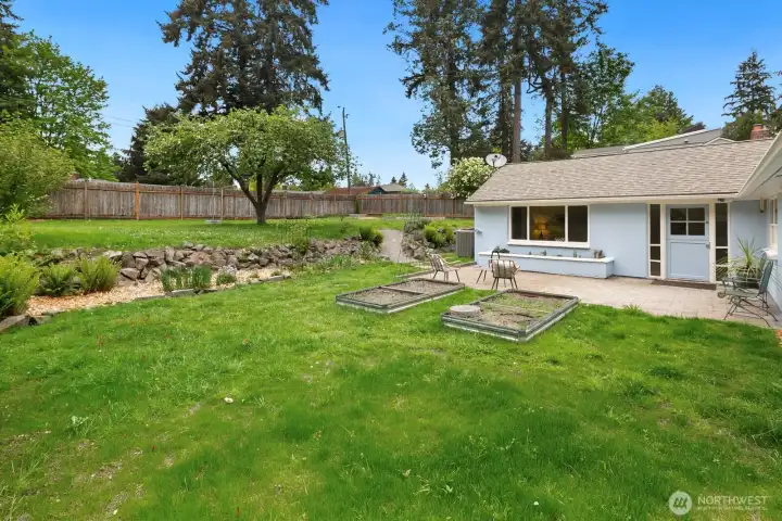 Enjoy the sunny back yard.  Back yard is fenced with gates in both side yards.