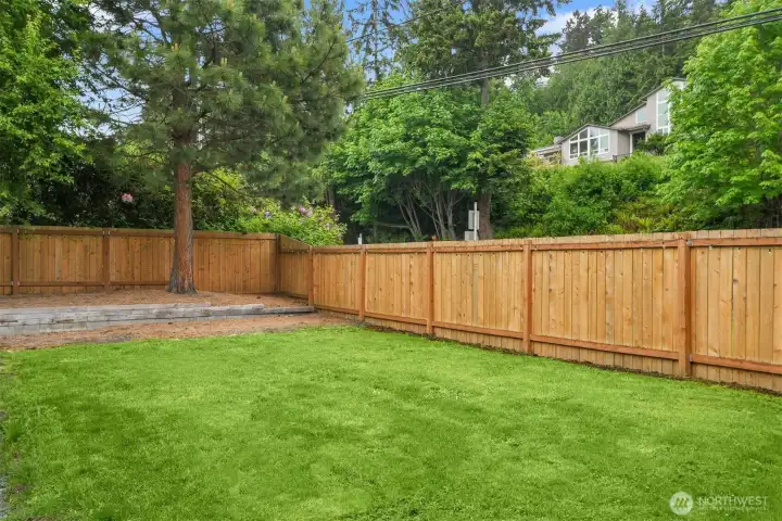 This home also includes a grassy south-facing side yard.