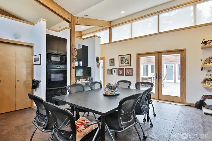 French doors off the kitchen open to an expansive deck. Step outside and embrace the coastal lifestyle.