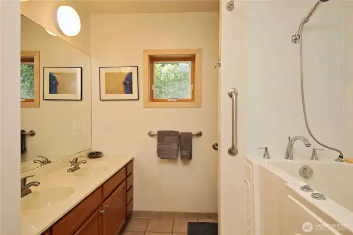 Walk in bathtub with spa jets and shower