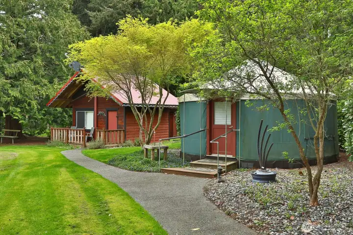 Charming guest Maincabin offers privacy and comfort. A unique yurt creates a one-of-a-kind experience.