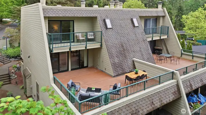 Expansive entertaining deck with seasonal city views.