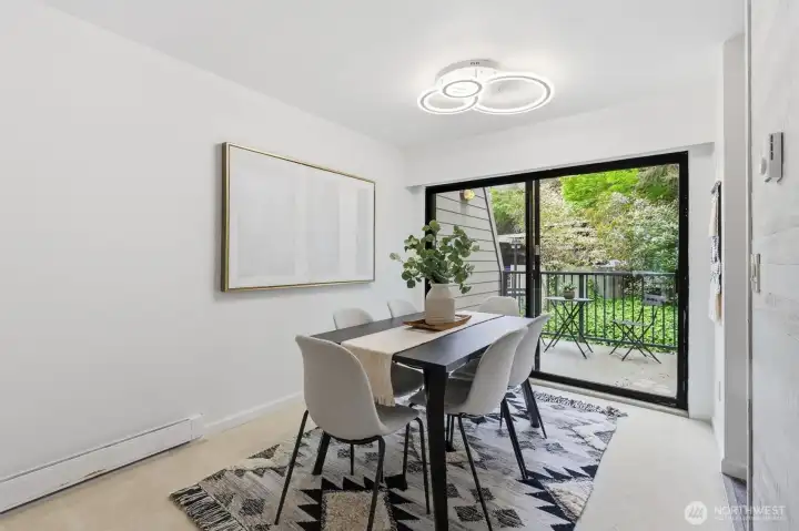 Dining room with adjacent patio/deck.
