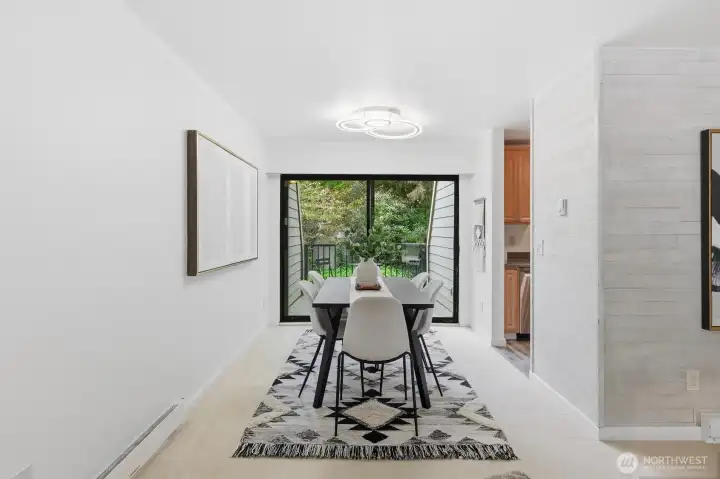 Dining room with adjacent patio/deck.