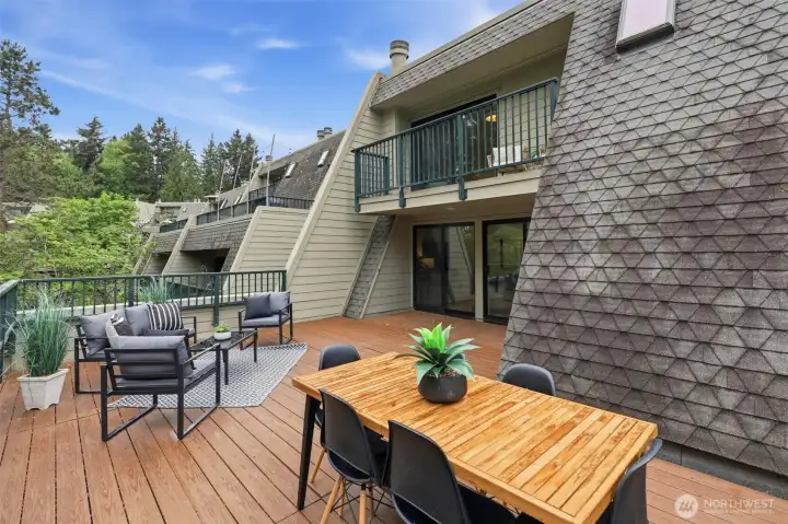 Large deck can accommodate multiple seating areas.