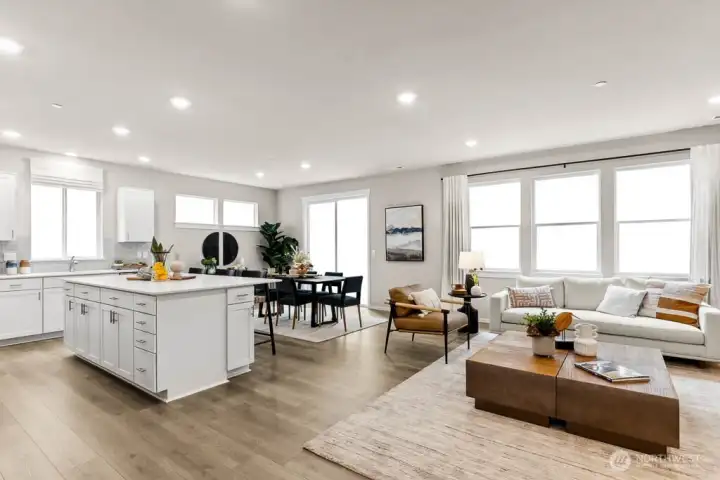 Huge eat in kitchen with oversized island. Photo rendering is representational and may be virtually staged. Actual home is under construction and finishes, elevation, and paint colors may vary. See site agent for details.