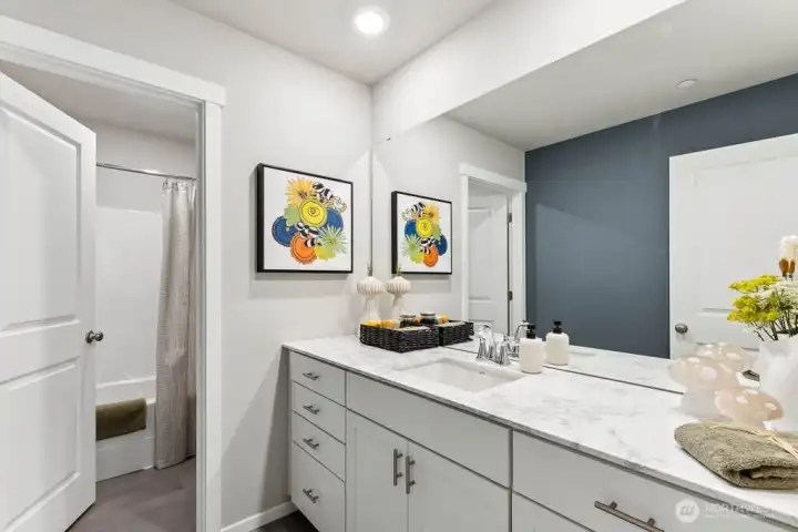 Photo rendering is representational and may be virtually staged. Actual home is under construction and finishes, elevation, and paint colors may vary. See site agent for details.