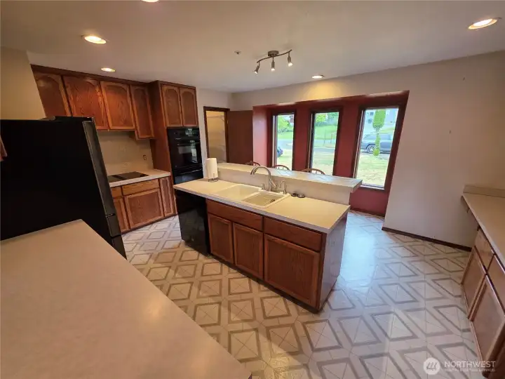 Large kitchen with island for eating and socializing Large kitchen with island for eating and socializing