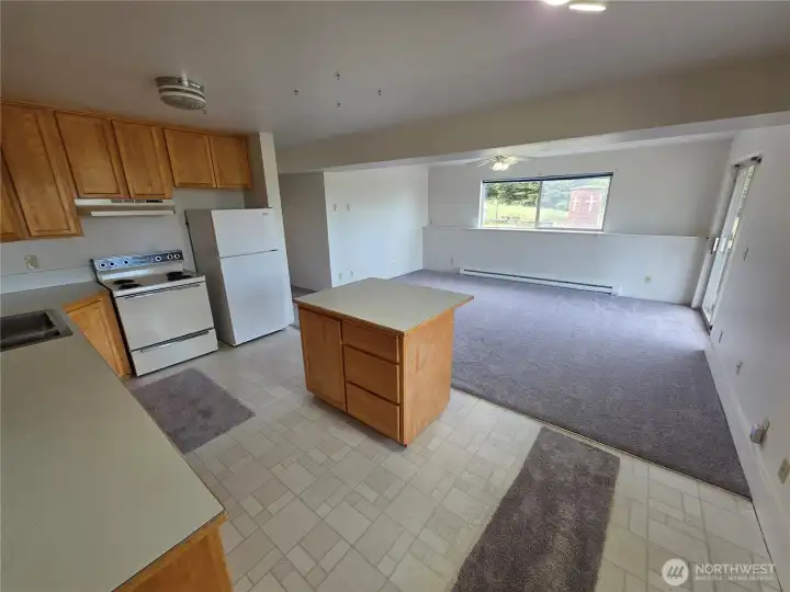 Attached ADU kitchen and living room. Attached ADU kitchen and living room.