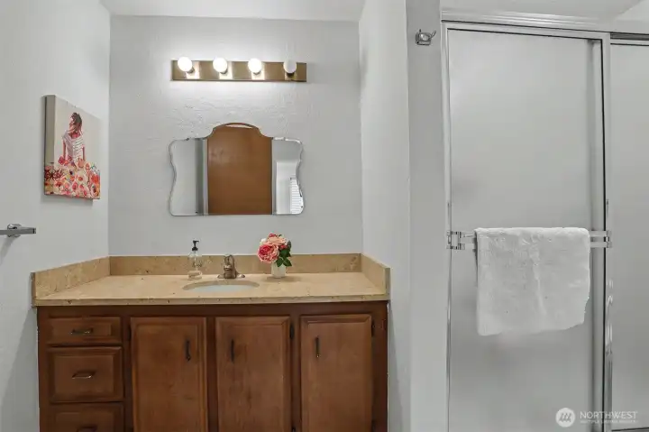 Safe walk in shower in the primary bath.