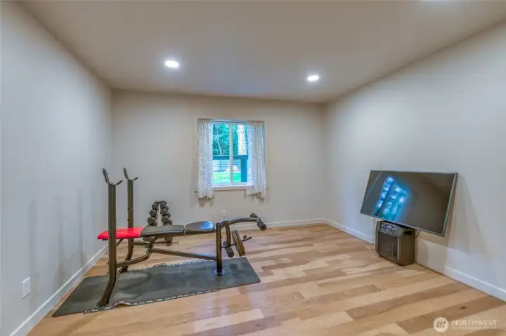 This downstairs bedroom is currently used as a home gym.