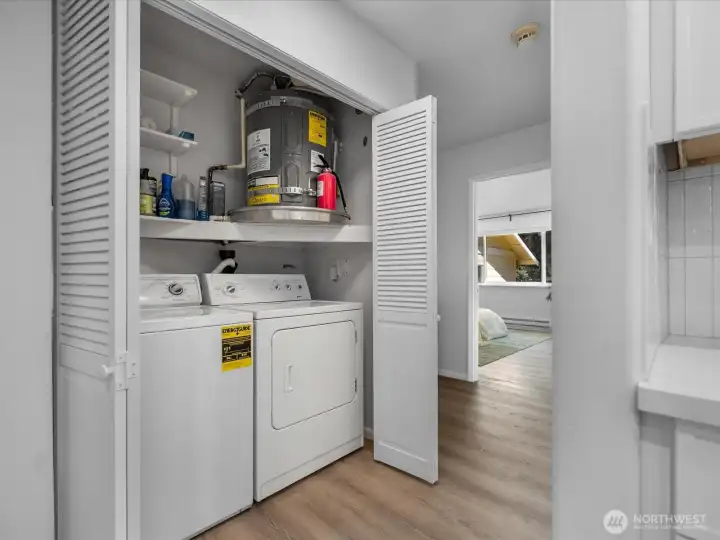 Water heater located in the closet with the washer/dryer. Water heater located in the closet with the washer/dryer.