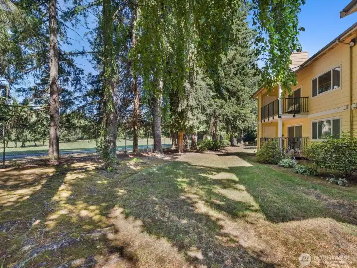 Green space just behind the unit is perfect for pets or just enjoying the outdoords! Green space just behind the unit is perfect for pets or just enjoying the outdoords!