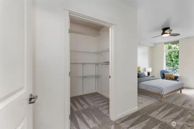 Large walk in closet off one of the bedroom suites. This condo is Virtual Staged.