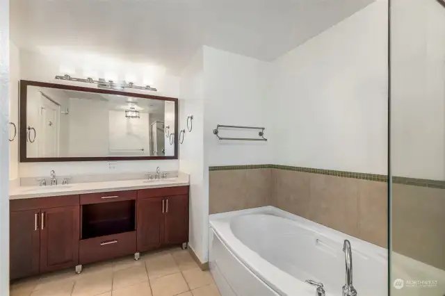 Dual sinks with tub and sperate shower.