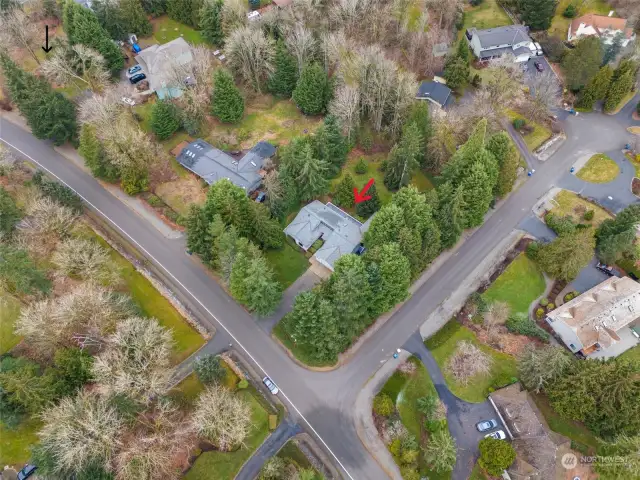 A bird's eye view of your spacious and wooded lot!