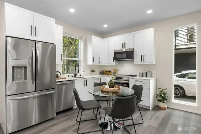 Your dream kitchen is here! Bright, open, and filled with top-tier stainless steel appliances, this space is ready for everything—from your morning coffee ritual to hosting the ultimate dinner party.