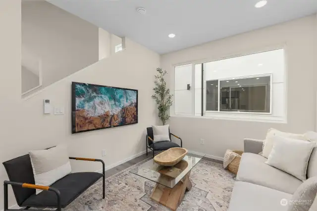 With a sleek staircase leading up, high ceilings, and modern finishes, this is where contemporary design meets everyday comfort. Time to make yourself at home!