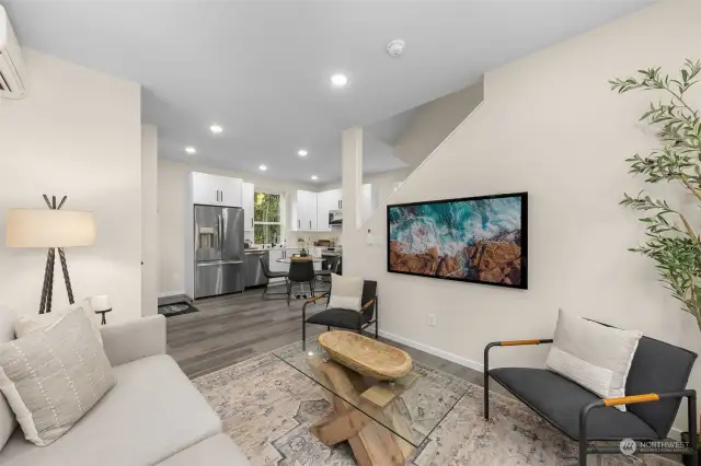 This open-concept layout keeps the conversation flowing from the kitchen to the living area—whether you're entertaining guests or unwinding with your favorite show.