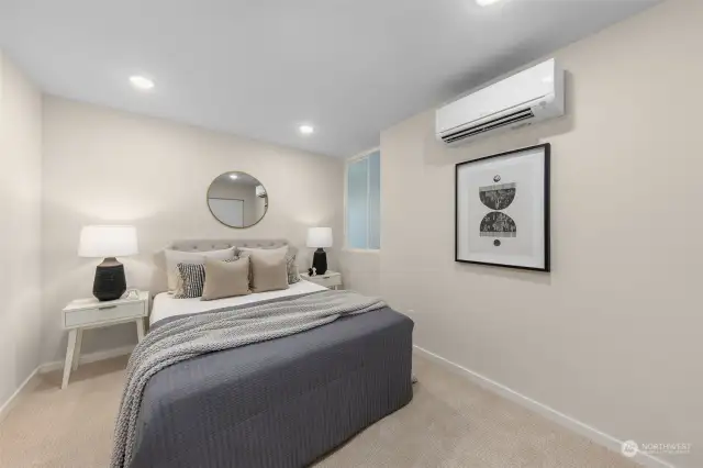 A bedroom that means business when it comes to comfort. Tucked away for extra privacy, this space is perfect for restful nights and lazy weekend mornings.