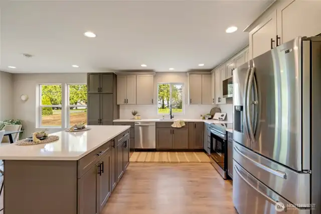 The kitchen island offers extra storage space, keeping everything organized and within reach.