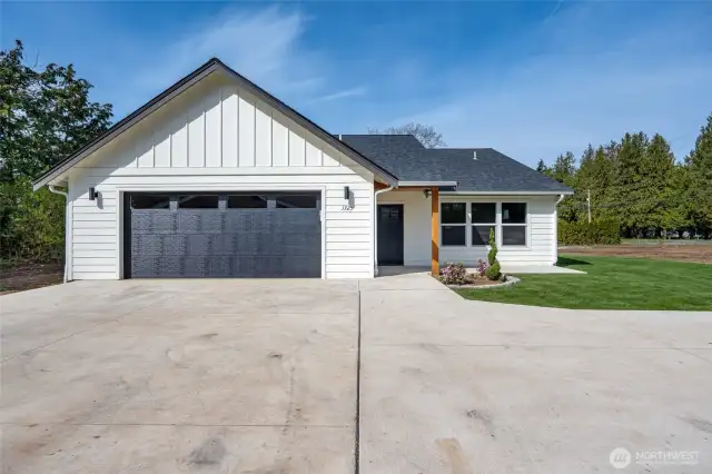 Seamless entry from the garage to the home and just steps to the front door.