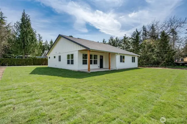 Enjoy outdoor living with a backyard and covered patio—perfect for relaxing evenings or weekend gatherings, rain or shine.