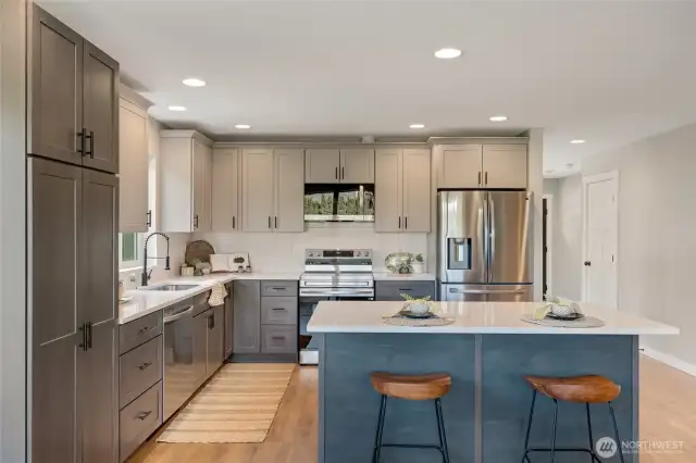 Brand new stainless steel appliances throughout make cooking and cleanup a breeze.